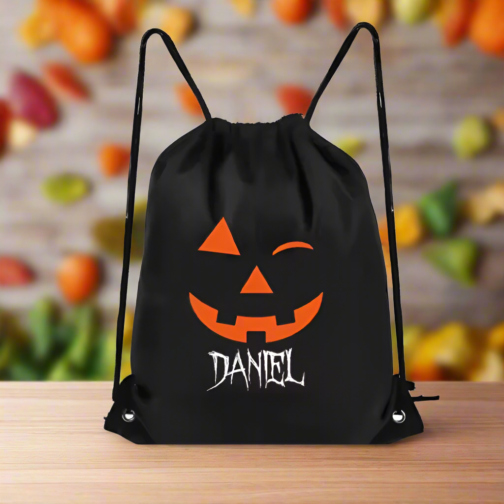 Personalized Halloween Drawstring Bag – Custom Name Trick or Treat Sack with Spooky Pumpkin Faces – Kids Candy Bag – 5 Pumpkin Face Designs