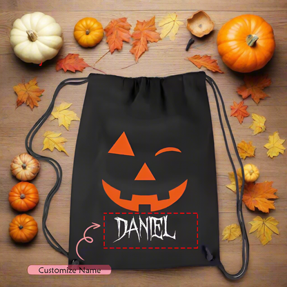 Personalized Halloween Drawstring Bag – Custom Name Trick or Treat Sack with Spooky Pumpkin Faces – Kids Candy Bag – 5 Pumpkin Face Designs